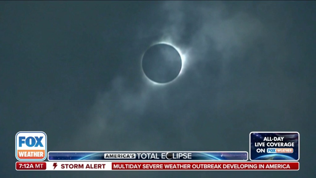 A total solar eclipse occurring under clear skies